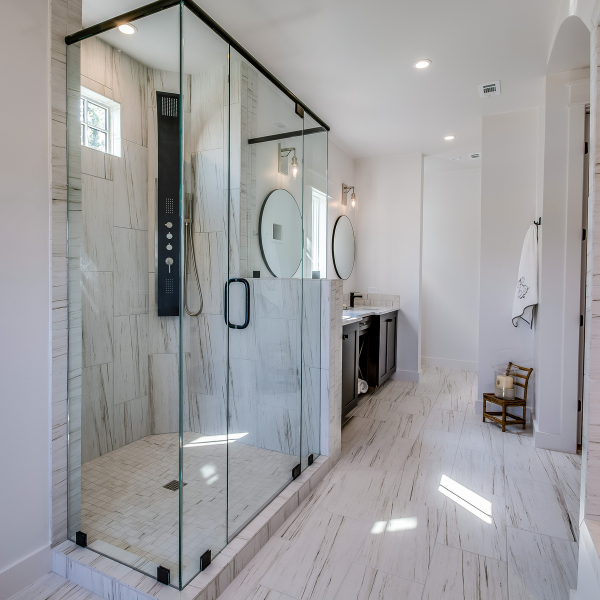 Remodeled modern bathroom with walk-in shower